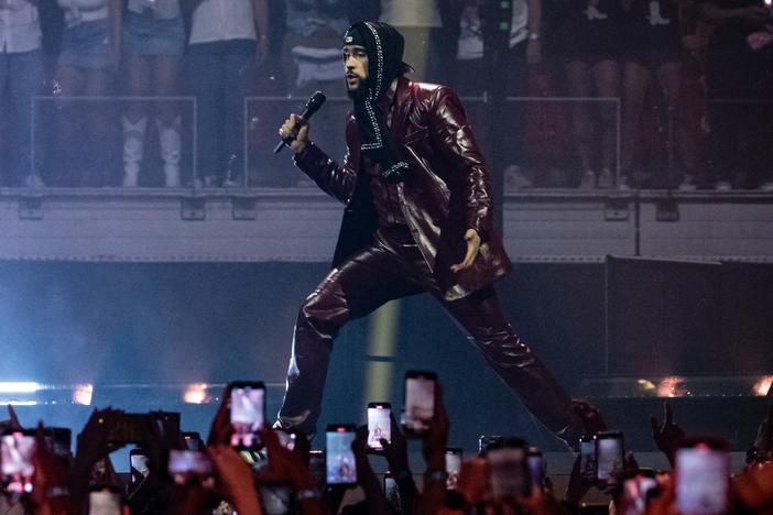 Bad Bunny on stage in Miami in May 2024. The Puerto Rican singer's latest album, <em>Debí Tirar Más Fotos</em>, topped <em>Billboard</em>'s album chart this week.