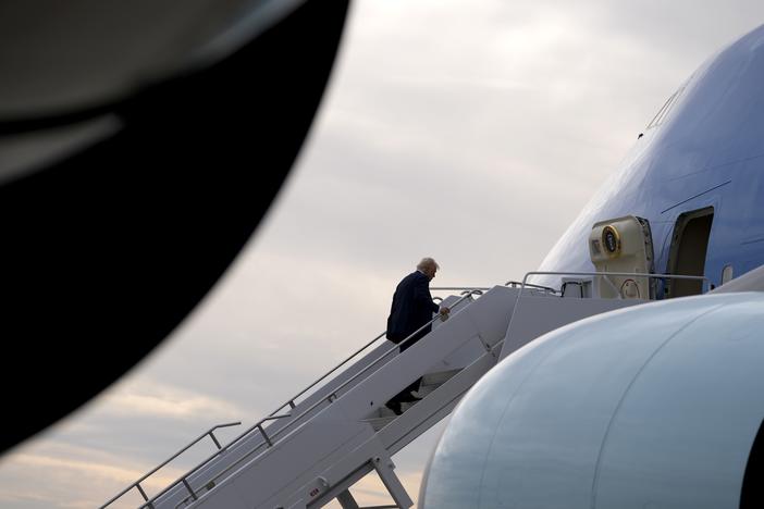 President Donald Trump boards Air Force One en route to Florida at Harry Reid International Airport in Las Vegas, on Saturday.