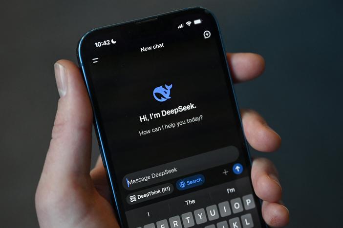 This photo illustration shows the DeepSeek app on a mobile phone in Beijing on Jan. 27. Chinese firm DeepSeek's artificial intelligence chatbot has soared to the top of the Apple Store's download charts.