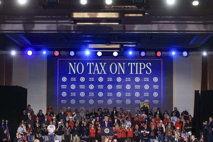 President Trump speaks at a rally at Circa Resort & Casino on Saturday. The event focused on Trump's first week in office, including his proposed policy to eliminate taxes on tips for service industry employees.