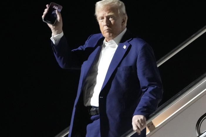 President Donald Trump arrives on Air Force One at Harry Reid International Airport in Las Vegas, Friday, Jan. 24, 2025.