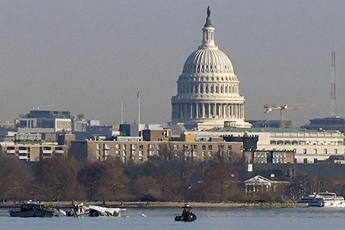 Search and rescue efforts are seen around a wreckage site in the Potomac River from Ronald Reagan Washington National Airport, early Thursday morning, Jan. 30, 2025, in Arlington, Va.