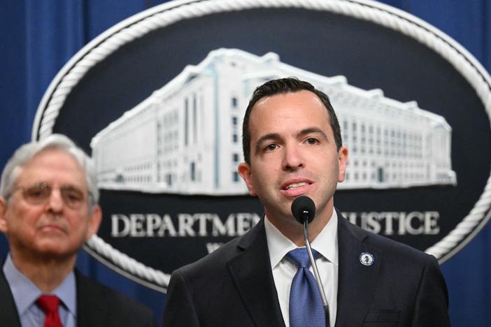 New Jersey Attorney General Matthew Platkin (center) speaks during a press conference at the Justice Department in Washington, DC, on March 21, 2024.
