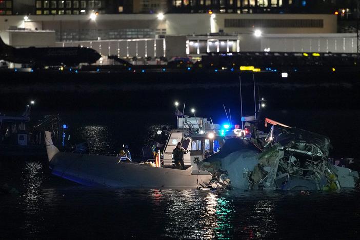 Emergency response units assess airplane wreckage in the Potomac River near Ronald Reagan Washington Airport on January 30, 2025 in Arlington, Virginia. An American Airlines flight from Wichita, Kansas collided with a helicopter while approaching Ronald Reagan National Airport.