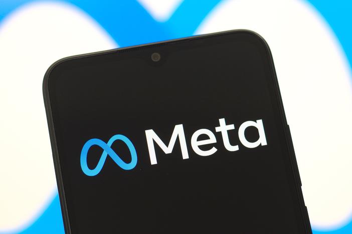 In this photo illustration, the Meta Platforms, Inc. logo is seen displayed on a smartphone screen.
