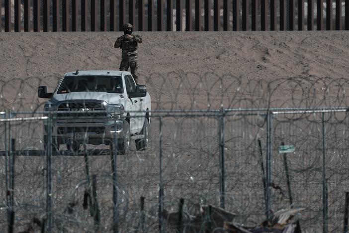 CIUDAD JUAREZ, MEXICO - U.S. Border Patrol agents and the Texas National Guard monitor the border between El Paso, Texas and Ciudad Juarez on January 24, 2025.