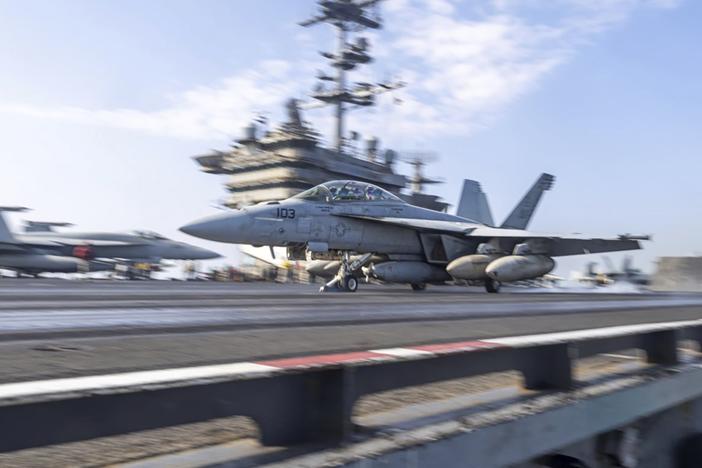 This photo provided by U.S. Africa Command, the U.S. military conducts coordinated airstrikes against Islamic State operatives in Somalia on Saturday.