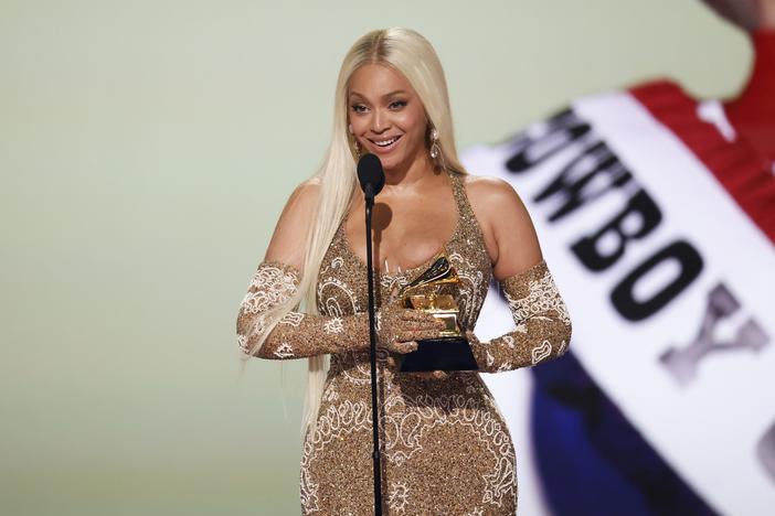 Beyoncé onstage Sunday night at the 67th Grammy Awards in Los Angeles, where her album <em>Cowboy Carter</em> received historic wins for best country album and album of the year.