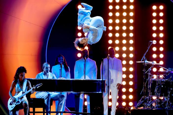 Benson Boone does a flip off the piano while performing his hit "Beautiful Things" at the Grammy Awards in Los Angeles on Feb. 2, 2025. Boone was one of several rising artists who made their Grammy debuts this year with far more adeptness than most rookies.