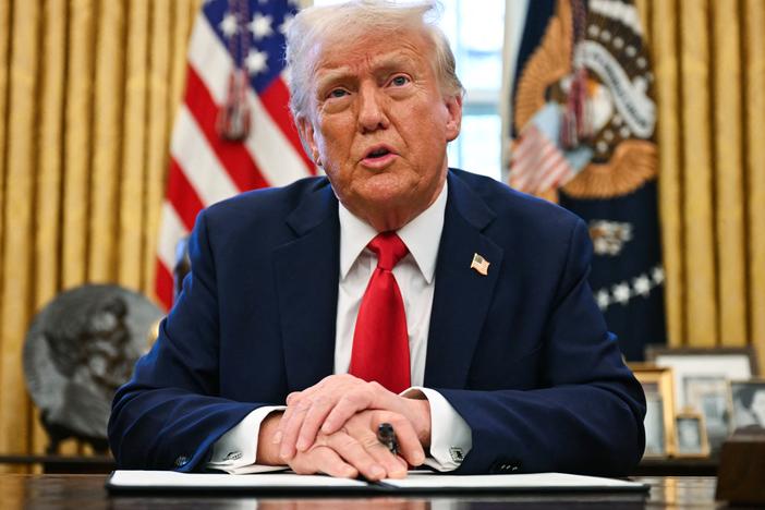 President Trump speaks to the press from the Oval Office on Monday.