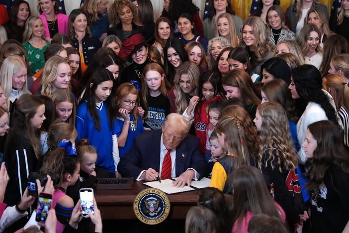 President Trump signed the "No Men in Women's Sports" executive order in the East Room at the White House on Wednesday. The order prohibits transgender women from competing in women's sports.
