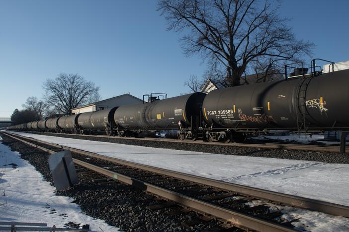 A long Norfolk Southern freight train passes through the town of East Palestine, Ohio on Jan. 17.
