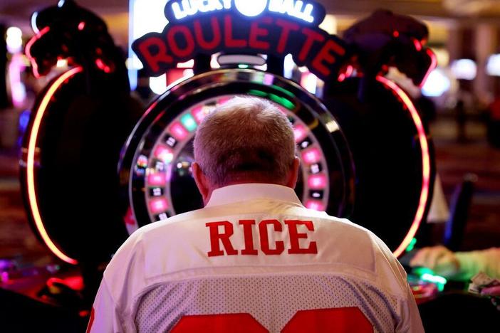 A man gambles in a casino ahead of last year's Super Bowl, on Feb. 8, 2024, in Las Vegas.