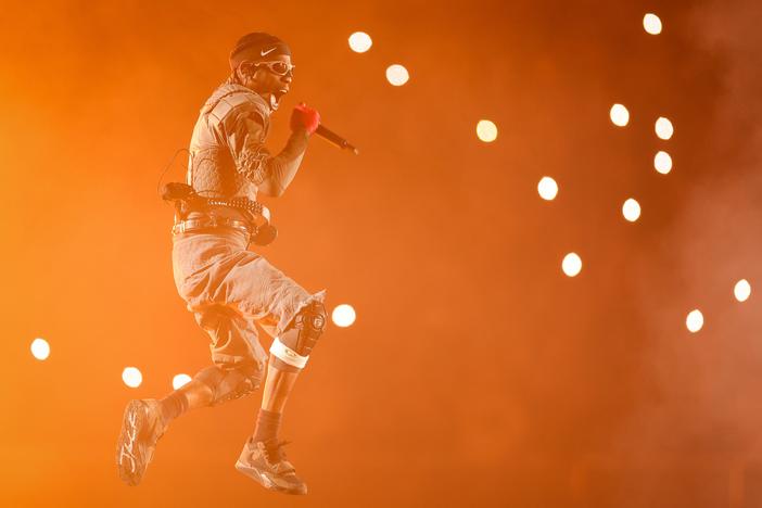 Travis Scott, seen here performing in the Netherlands in 2024, scored his fifth No. 1 pop hit this week with "4X4." Of those five hits, four topped <em>Billboard</em>'s Hot 100 in their first week after being released.