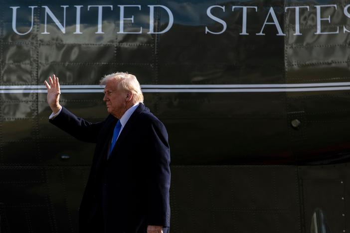 President Trump walks on the South Lawn of the White House before boarding Marine One in Washington, D.C., on Friday.