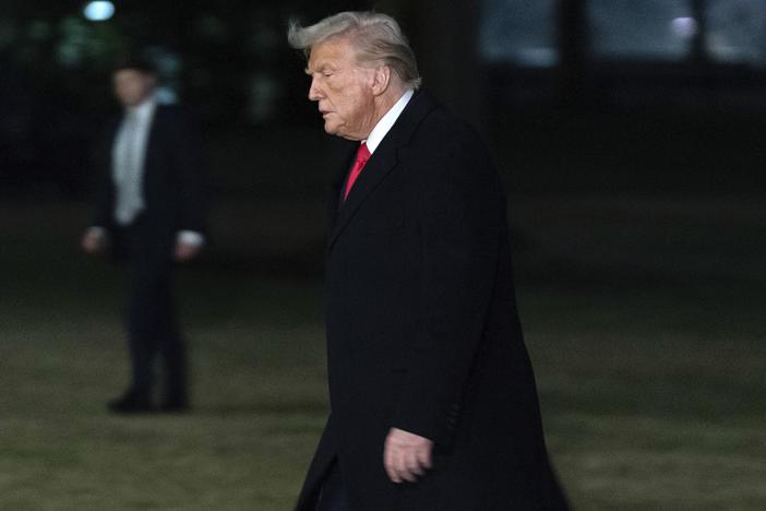 President Trump arrives back at the White House after visiting New Orleans to attend the Super Bowl. A federal judge on Monday found that the administration has not fully followed his order to unfreeze federal spending.