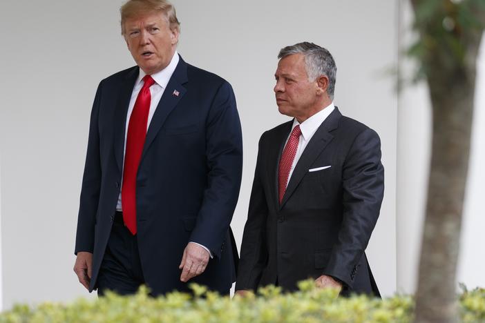 President Trump walks with King Abdullah II of Jordan at the White House, on June 25, 2018, in Washington.