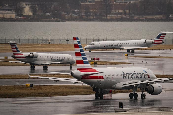 American Eagle and American Airlines planes taxi at the Ronald Reagan Washington National Airport, on February 6, 2025 in Arlington, Va. The Federal Aviation Administration has reopened two of the airport's runways following the January 29 mid-air collision between a U.S. Army Black Hawk helicopter and an American Airlines regional jet that was landing at DCA.