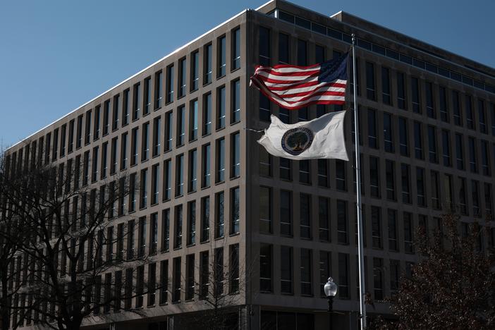 Flags fly outside the U.S. Education Department in Washington, D.C.