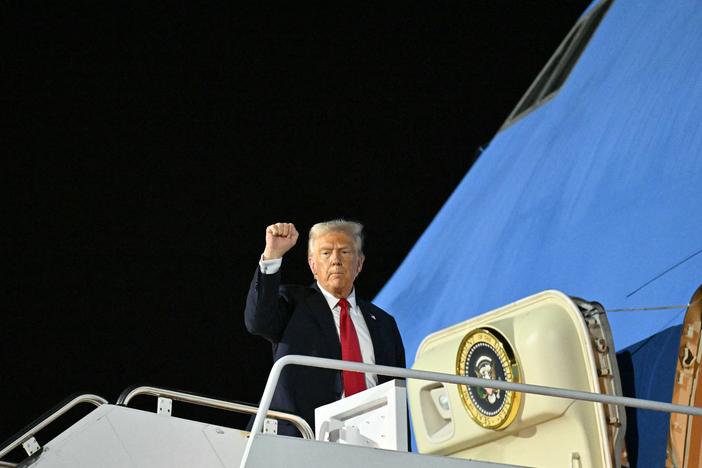 President Trump boards Air Force One in Louisiana as he returns to Washington after attending Super Bowl LIX.