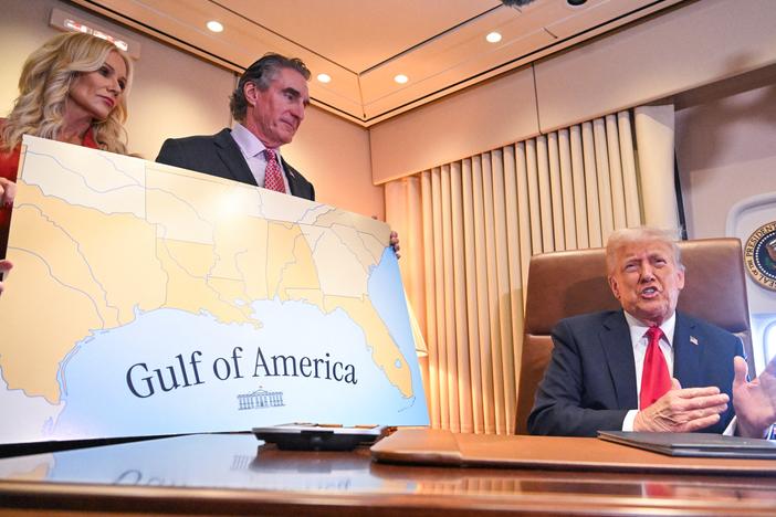 President Trump speaks to the press before signing a proclamation renaming the Gulf of Mexico as the Gulf of America aboard Air Force One en route to New Orleans, Louisiana, on Feb. 9, 2025.