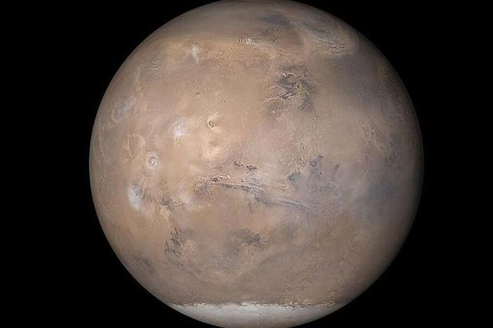 Mars, from composite of photos from three cameras from the Mars Global Surveyor (MGS) Mars Orbiter Camera (MOC) experiment, obtained on May 12, 2003.