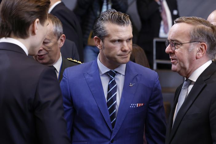 U.S. Defense Secretary Pete Hegseth (center) speaks with German Defense Minister Boris Pistorius (right) and Finland's defense minister, Antti Hakkanen, at NATO headquarters in Brussels, Thursday.