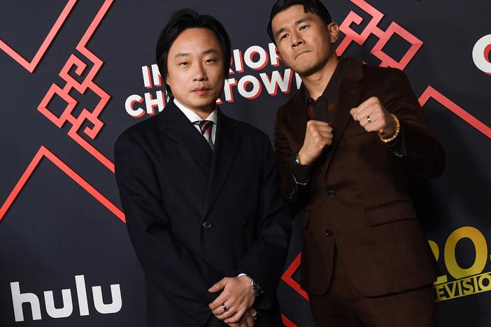Jimmy O. Yang (left) and Ronny Chieng (R) at the premiere of Hulu's "Interior Chinatown."