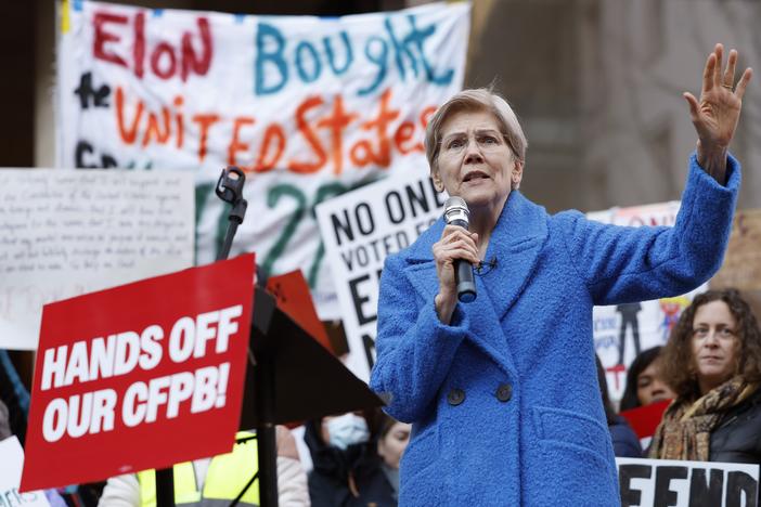 Sen. Elizabeth Warren, D-Mass., speaks at a rally outside the Consumer Financial Protection Bureau in Washington, D.C., on Feb. 10, 2025. Dozens of CFPB workers were laid off on Tuesday, the agency's union said.