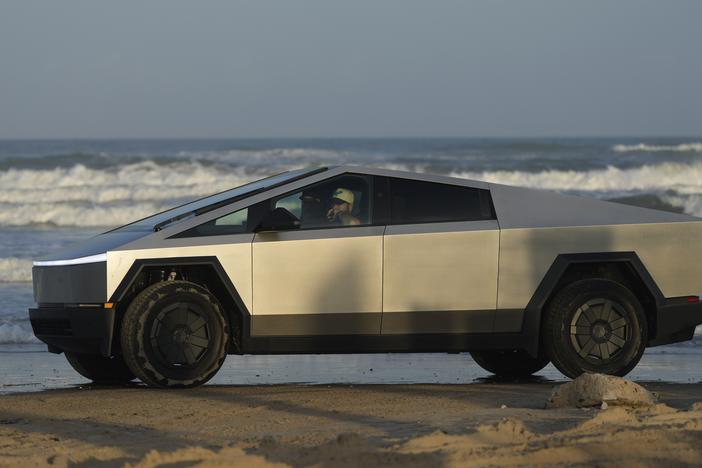 A Tesla Cybertruck moves along the beach in Boca Chica, Texas, on Nov. 18, 2024.