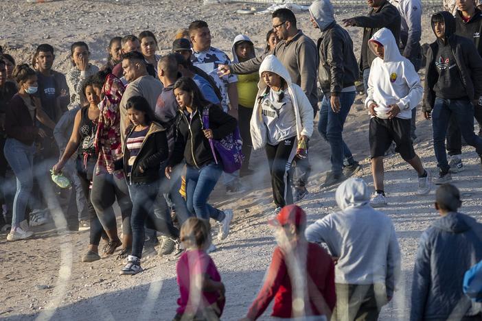 Unaccompanied minors walk towards U.S. Border Patrol vehicles after crossing over from Mexico on May 09, 2023, in El Paso, Texas.