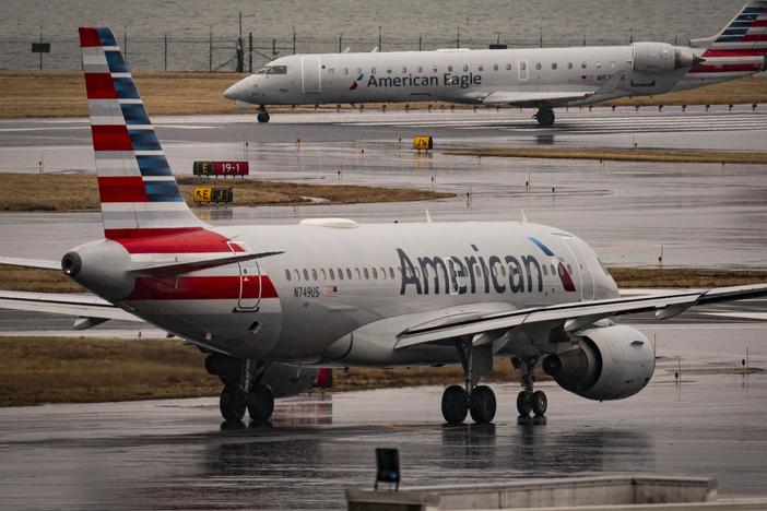 An American Eagle and American Airlines plane taxi on the runway at Ronald Reagan Washington National Airport, on February 6, 2025 in Arlington, Virginia. Investigators with the National Transportation Safety Board says a mid-air collision between an American Airlines flight and U.S. Army Black Hawk helicopter on January 29 may have been the result of a malfunctioning altimeter on the helicopter.