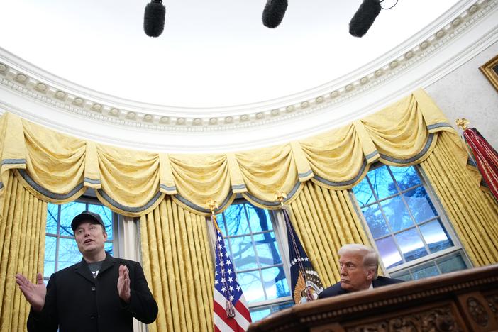 Tesla and SpaceX CEO Elon Musk delivers remarks alongside President Trump during an executive order signing in the Oval Office at the White House on Tuesday.