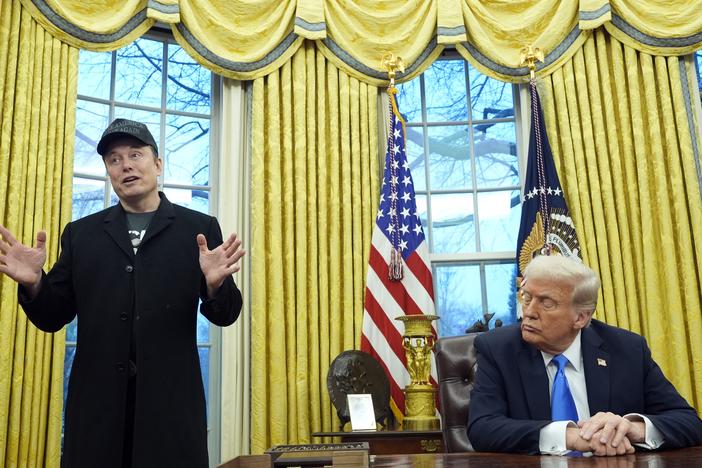 President Donald Trump listens as Elon Musk speaks in the Oval Office at the White House, Tuesday, Feb. 11, 2025, in Washington. (Photo/Alex Brandon)