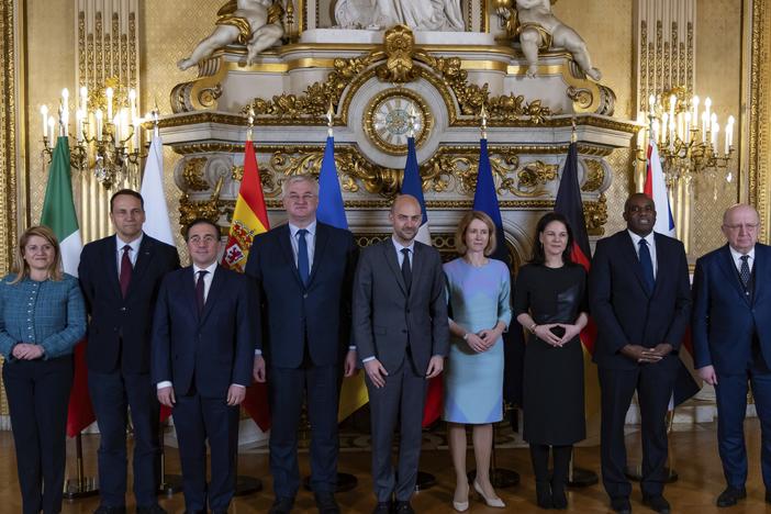 Leaders from Italy, Poland, Spain, Ukraine, France, Germany and the EU pose for a group photo during a meeting on European defense and Ukraine, at the Quai d'Orsay in Paris on Feb. 12.