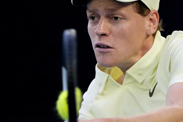 Jannik Sinner plays a backhand return to Alexander Zverev during the men's singles final at the Australian Open tennis championship in Melbourne on  Jan. 26.