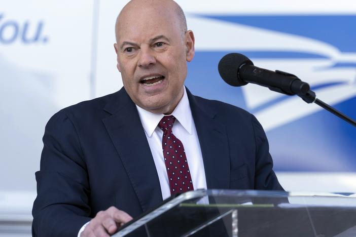 Postmaster General of the United States Louis DeJoy is shown speaking during a news conference on Dec. 20, 2022, in Washington.