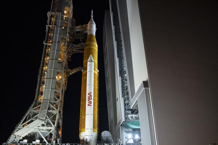 NASA's Space Launch System (SLS) rocket, with the Orion spacecraft aboard the mobile launcher as it rolls out of the Vehicle Assembly Building to Launch Pad 39B, on Nov. 3, 2022, at Kennedy Space Center at Cape Canaveral, Fla., in preparation for a launch.