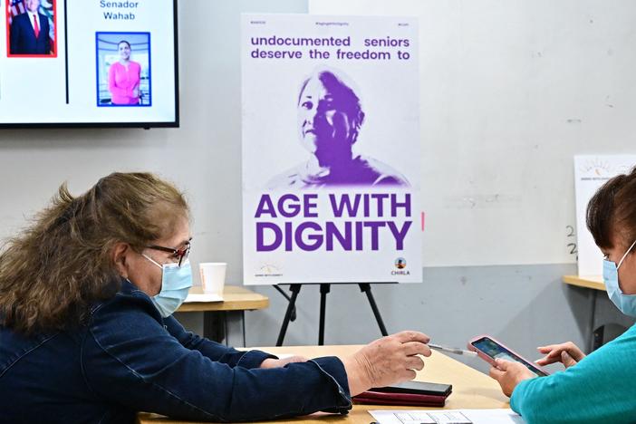 Immigrant seniors and people with disabilities call California lawmakers asking for support of a bill expanding immigrant benefits in August 2023.