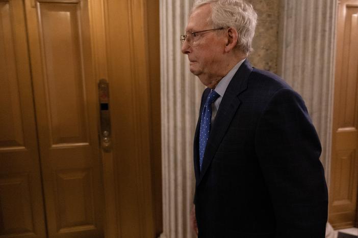 Sen. Mitch McConnell, R-Ky., arrives to cast his vote at the U.S. Capitol on Jan. 24.