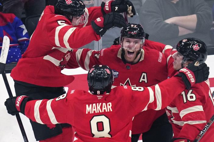 Canada's Connor McDavid (97) celebrates after his game-winning goal against the United States  on Thursday during an overtime period of the 4 Nations Face-Off championship hockey game in Boston. (AP Photo/Charles Krupa)