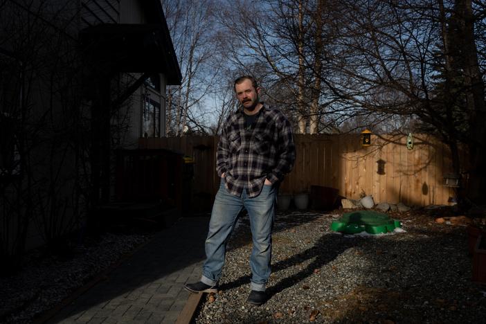 Mike Macans stands for a portrait outside of his home in Anchorage, Alaska, on Feb. 23, 2025. Macans served in the U.S. Army for five years and was most recently working as a disaster recovery coordinator for the Small Business Administration. He was officially terminated from his job on Feb. 11, 2025.
