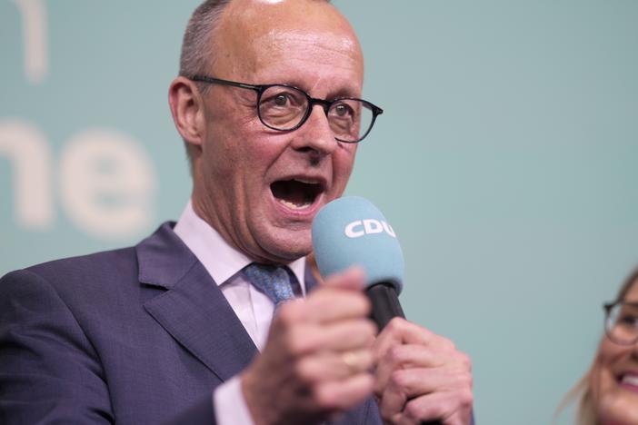 Friedrich Merz, the candidate of the mainstream conservative Christian Democratic Union party, gestures while addressing supporters at the party headquarters in Berlin, Germany, on Sunday.