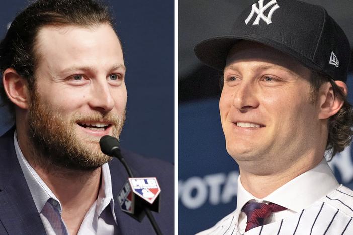This combo of file photos shows Houston Astros starting pitcher Gerrit Cole on Oct. 14, 2019, and being introduced as a New York Yankees player on Dec. 18, 2019.