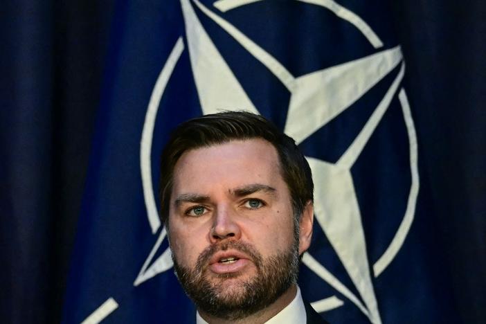 Vice President JD Vance talks in front of the NATO logo at the Munich Security Conference in Munich, Germany, on Feb. 14.