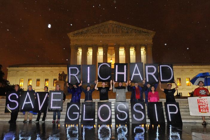 Anti-death penalty activists rally outside the U.S. Supreme Court on Sept. 29 in an attempt to prevent the execution of Oklahoma inmate Richard Glossip.