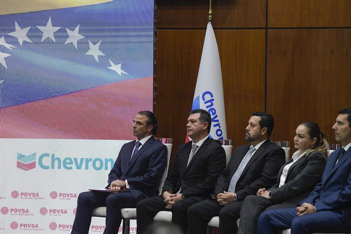 Chevron President in Venezuela, Javier La Rosa, left, attends a signing agreement ceremony between Venezuela and the California-based Chevron, in Caracas, Venezuela, Dec. 2, 2022.