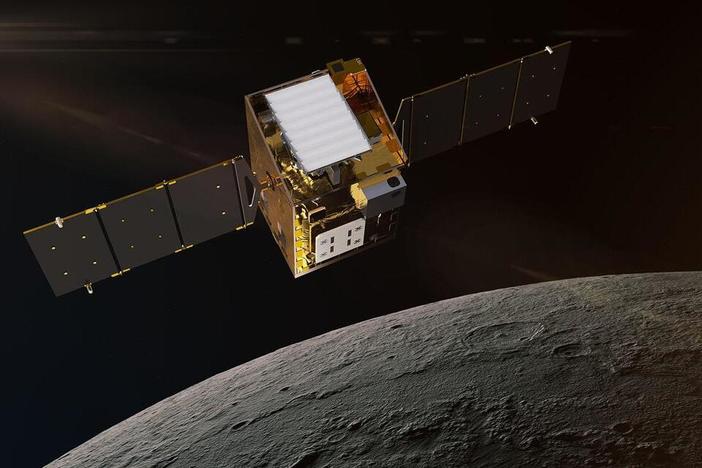 This artist's concept depicts NASA's Lunar Trailblazer in lunar orbit about 60 miles from the surface of the moon. The spacecraft weighs 440 lbs and  is 11.5 feet wide when its solar panels are fully deployed.