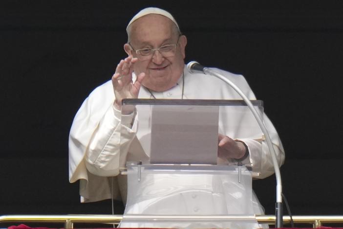 Pope Francis delivers his blessing as he recites the Angelus noon prayer from the window of his studio overlooking St. Peter's Square, at the Vatican, Sunday, Feb. 2, 2025.
