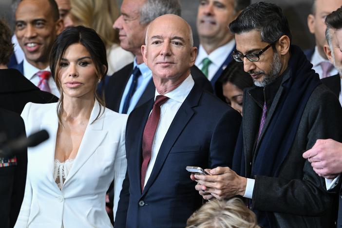<em>Washington Post </em>owner Jeff Bezos, center, shown at the inauguration ceremony of President Trump at the U.S. Capitol in January.